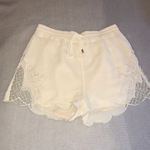 White shorts with lace
